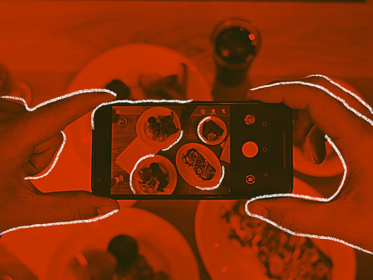 Orange-toned visual of a phone capturing food content for content marketing